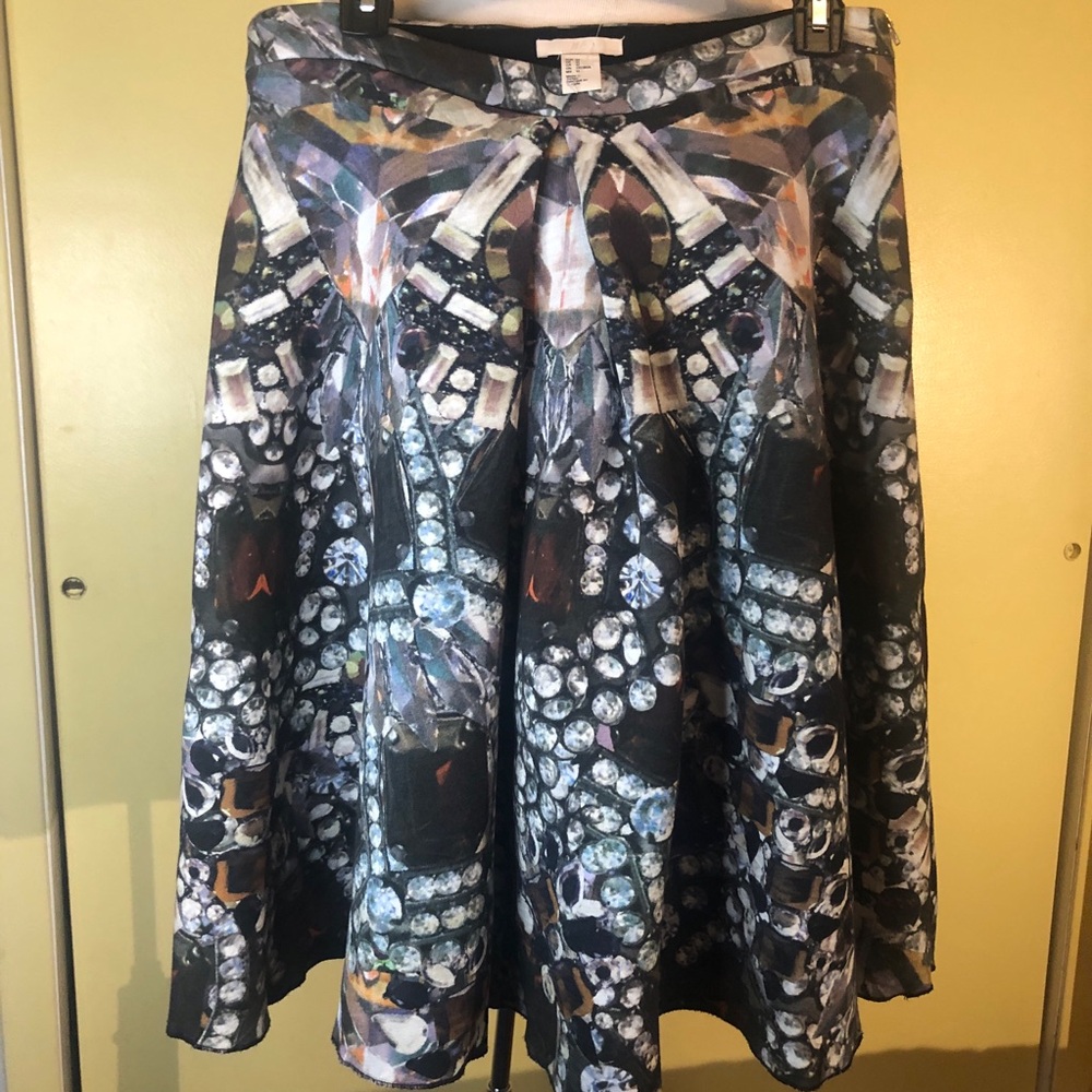 H & M 💐Neoprene gemstone laser print skirt. Size 12. Pleated front.